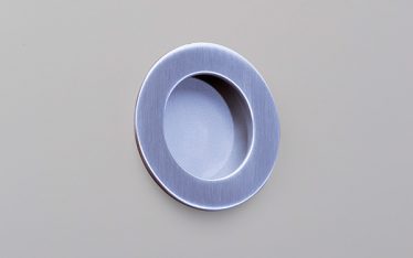 Circular-flush-pull-on-GREY-PAINT