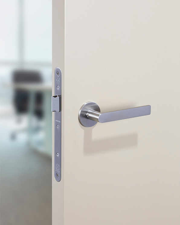 Flat_front_stainless_steel-lever-on-GREEN-PAINT