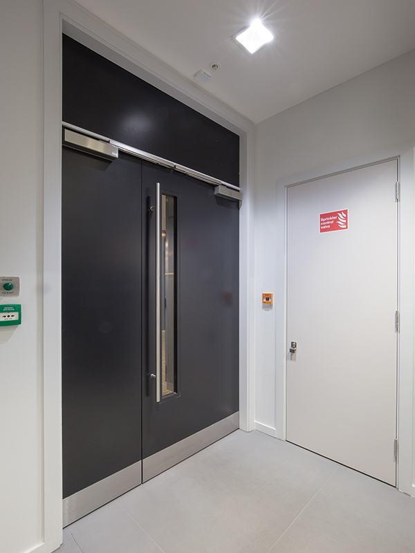 Shadbolt veneered leaf and half doors at 20 Old Bailey