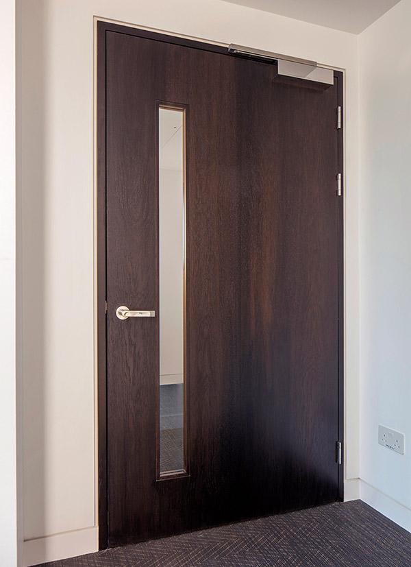 Shadbolt veneered door with glazing aperture at No1 New Oxford Street